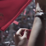 A Pañuelo raised in the air at the opening ceremonies of the Running of the Bulls in Pamplona, Spain