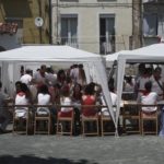 pamplonans-enjoying-cuadrilla-dinner-on-street