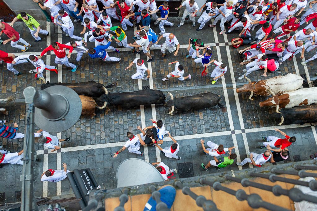 running with the bulls in streets of pamplona